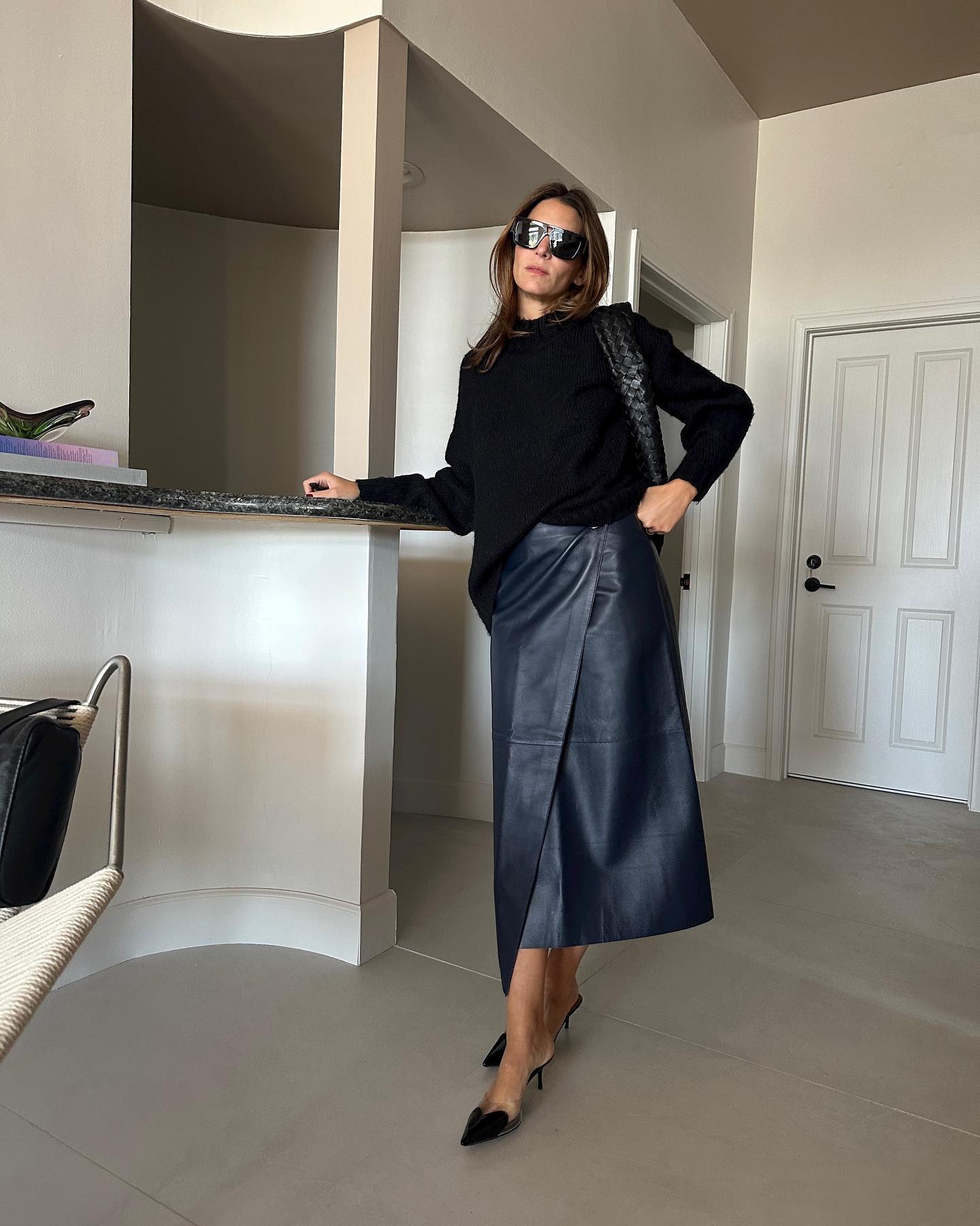Navy Blue Leather Wrap Skirt with Black Sweater and Pointed-Toe Heels Navy Blue Leather Wrap Skirt with Black Sweater and Pointed-Toe Heels — Leather Skirt Outfits