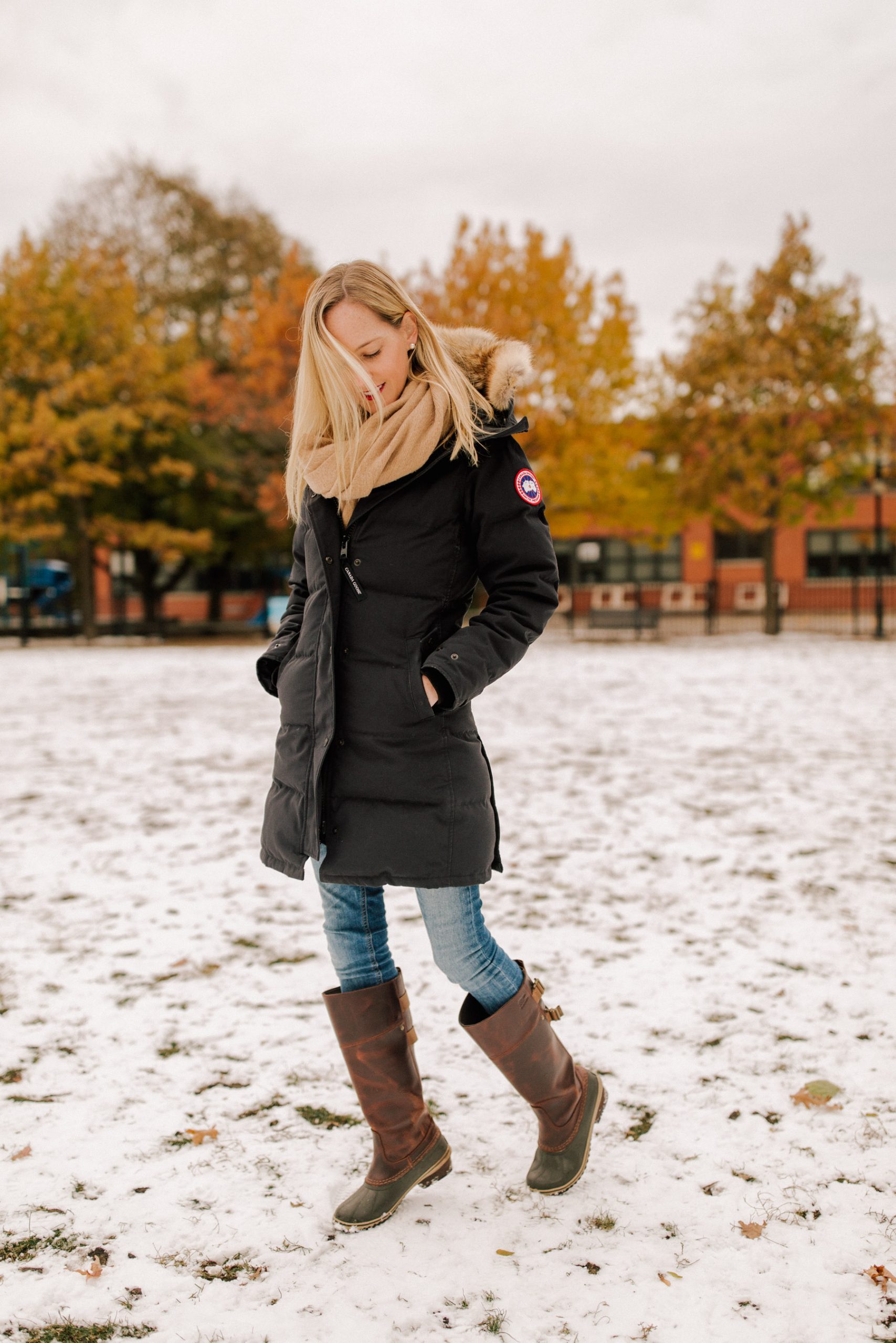 Fur-Trimmed Puffer Coat with Light Blue Top and Jeans Fur-Trimmed Puffer Coat with Light Blue Top and Jeans — Preppy Winter Outfits