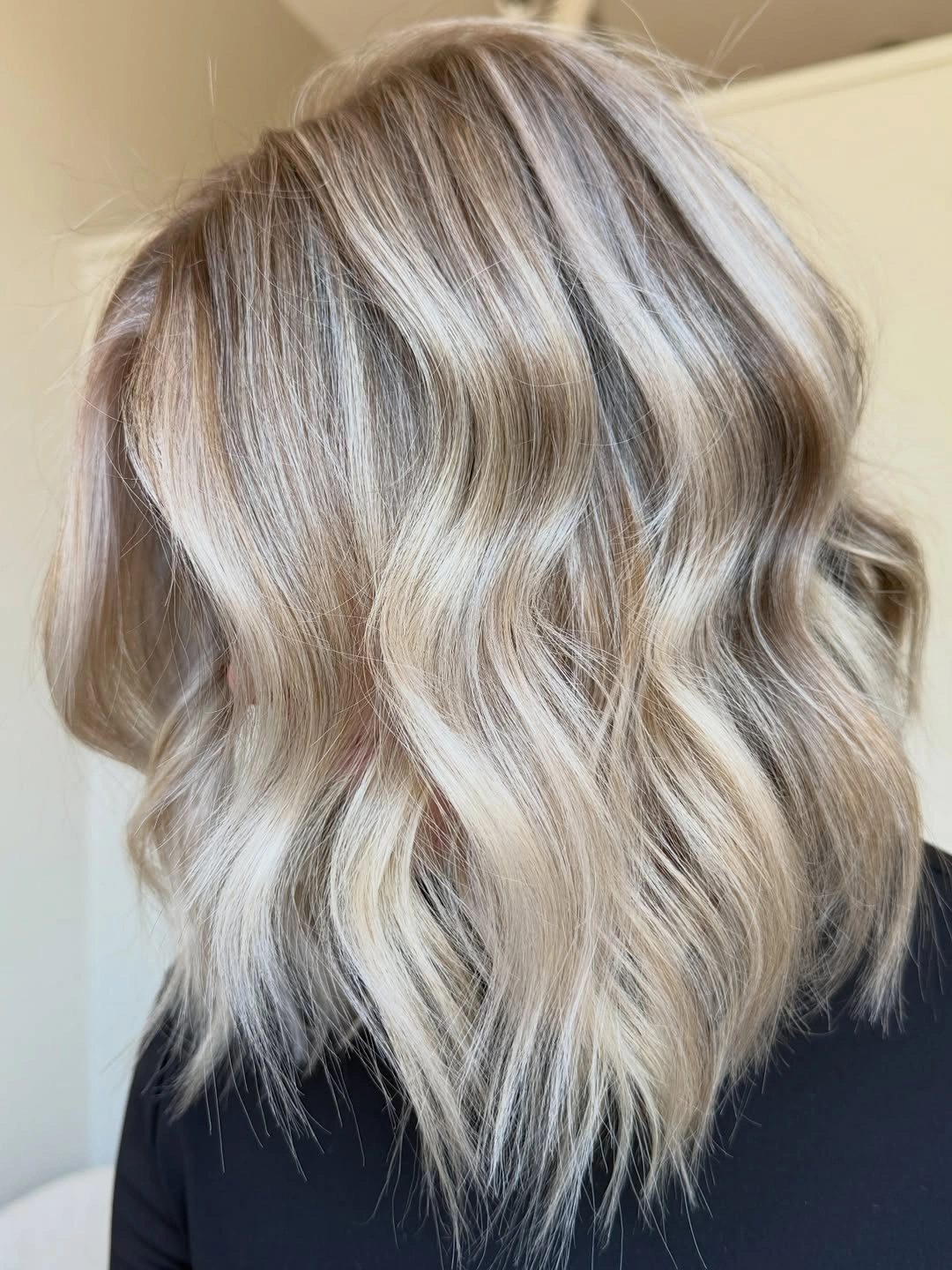 a-line bob haircuts Soft Wavy Blonde Bob With Natural Dimension