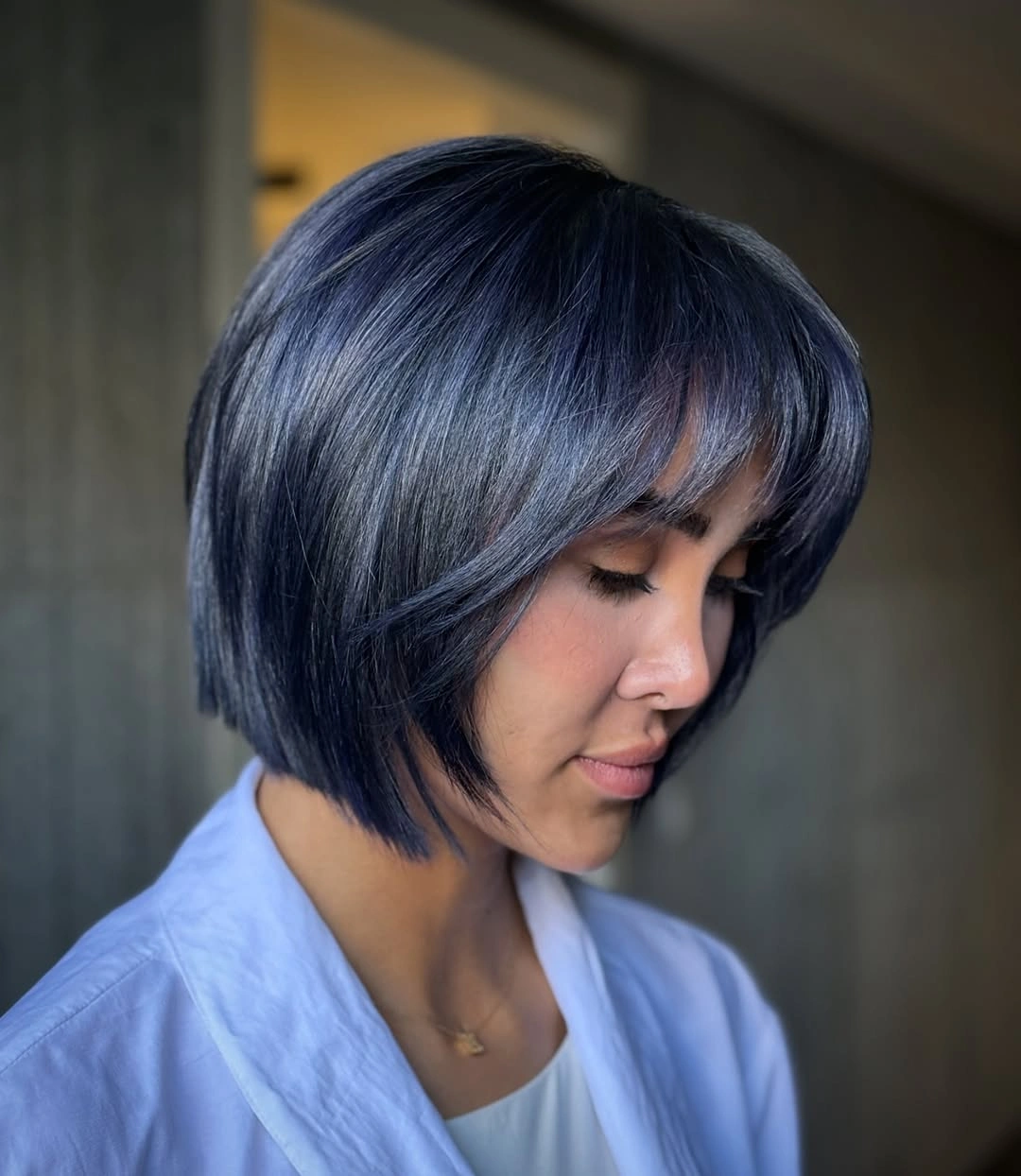 a-line bob haircuts Blue Black Bob With Soft Curtain Bangs