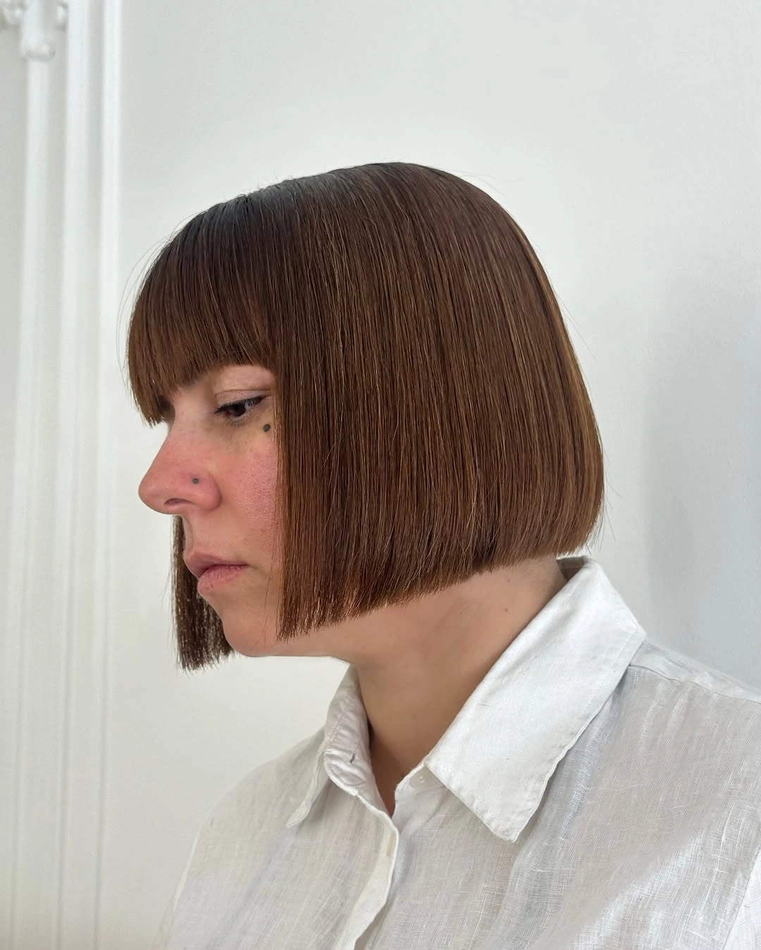 a-line bob haircuts Polished Brown Bob With Full Bangs