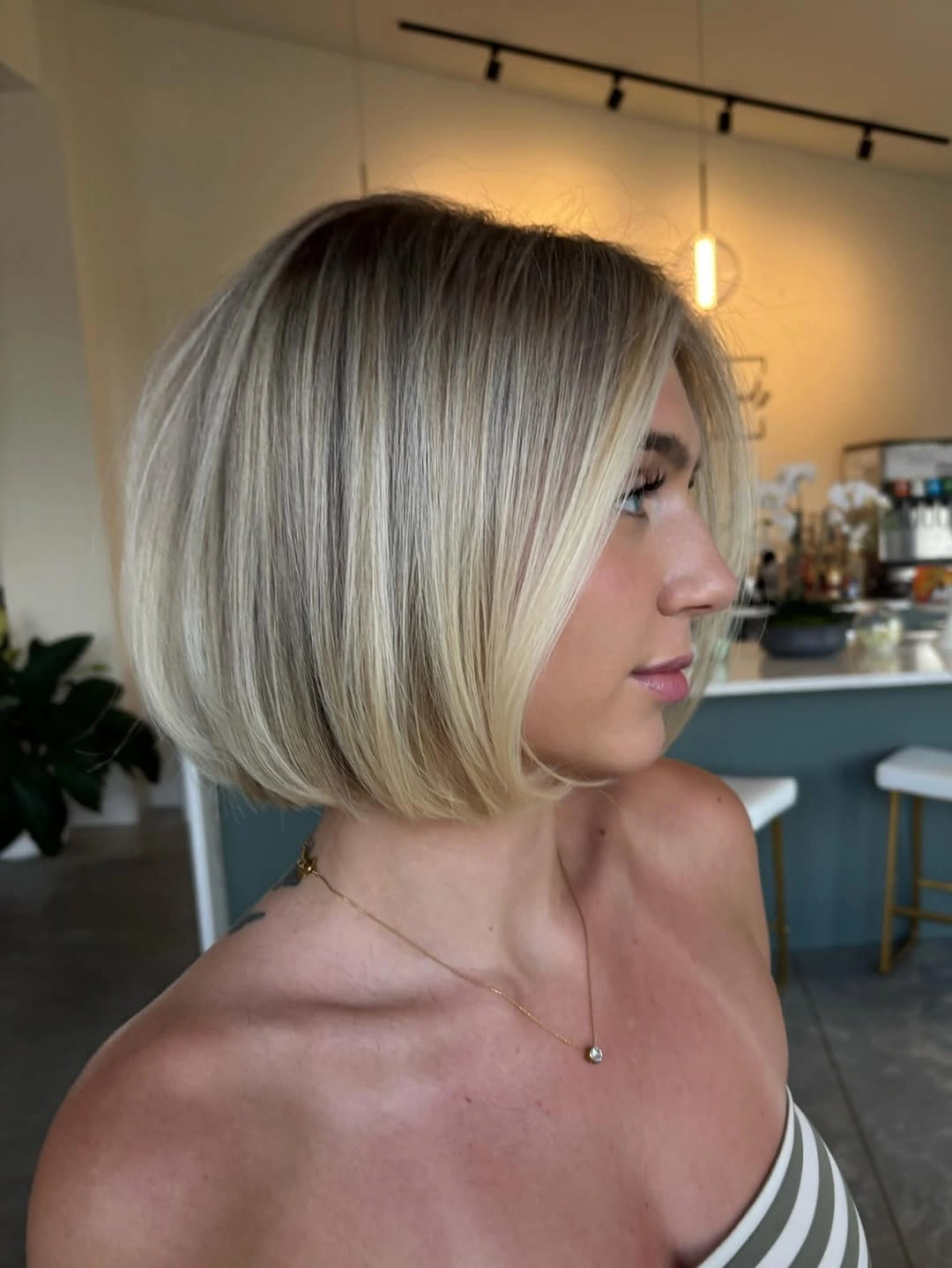 a-line bob haircuts Blonde A Line Bob With Face Framing Bangs