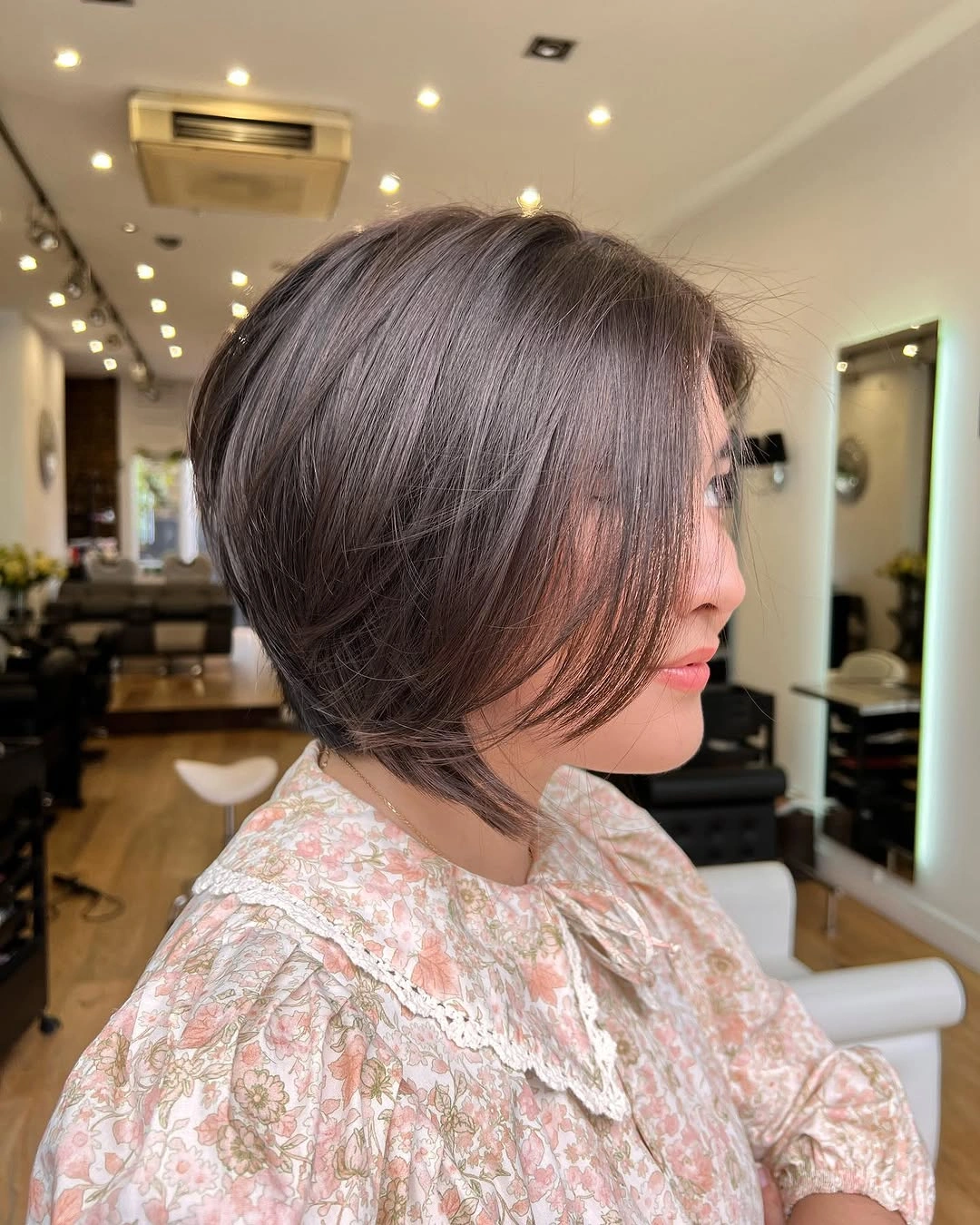 a-line bob haircuts Smoky Brown Layered A Line Bob With Airy Texture