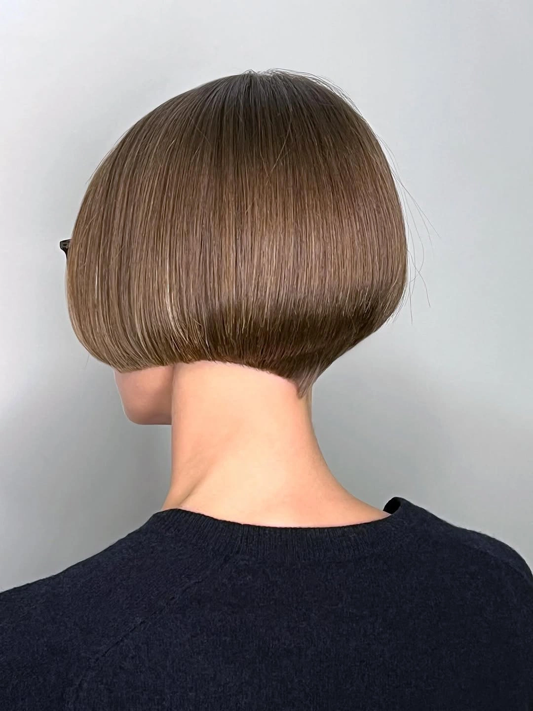 a-line bob haircuts Rounded Brunette Bob With a Sharp Perimeter