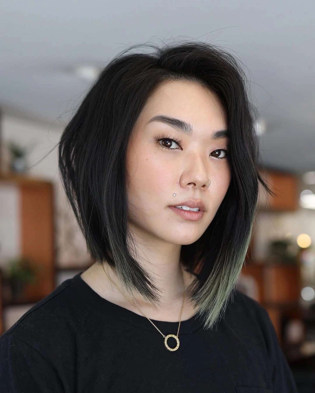 a-line bob haircuts Dark A Line Bob With Face Framing Layers