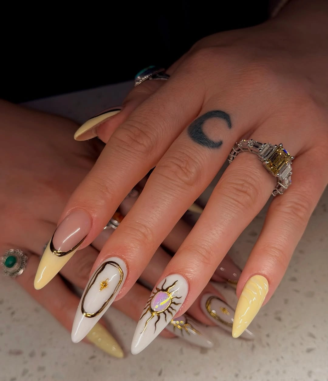 almond nails 2027 yellow white gold almond design