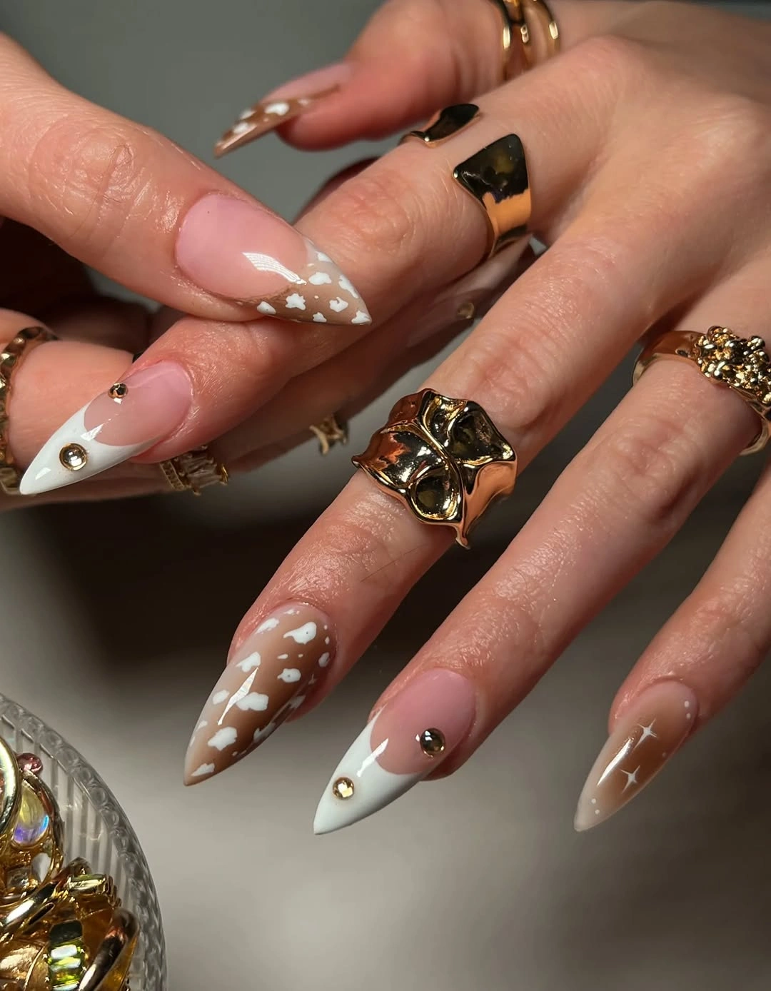 almond nails 2027 brown white French tip design