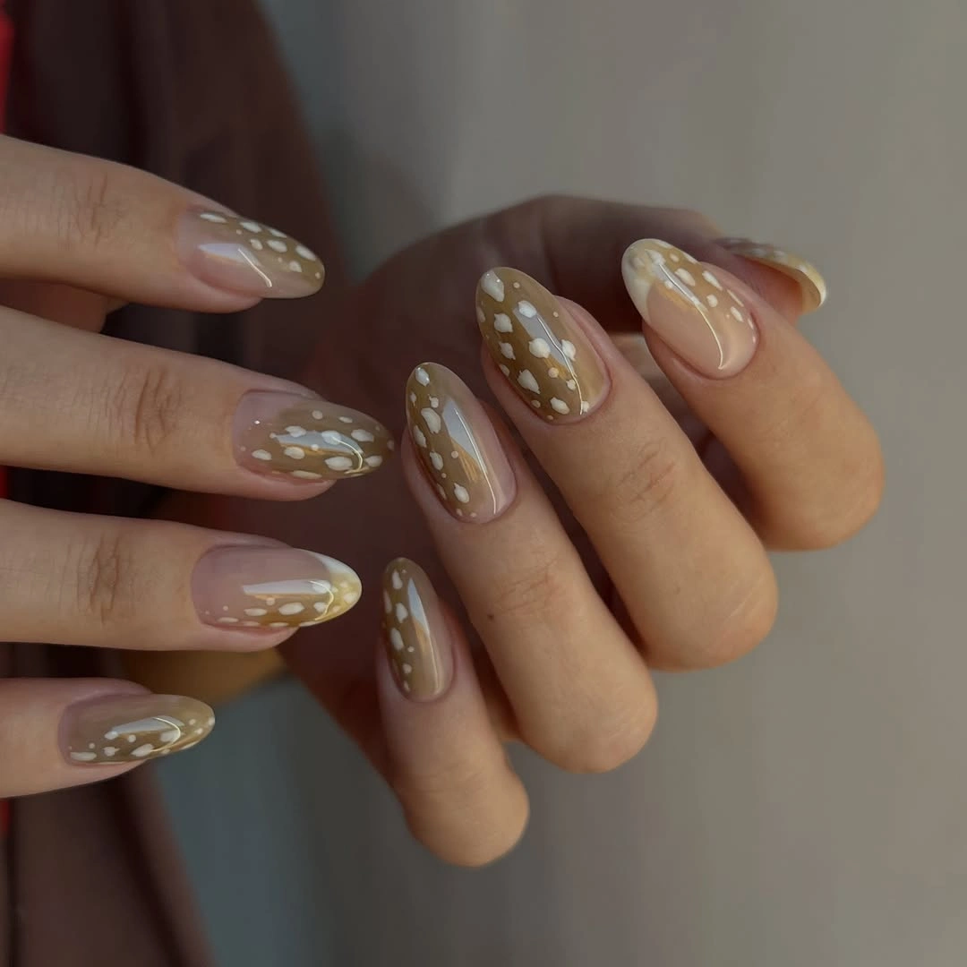 almond nails 2027 short taupe almond nails with white dots