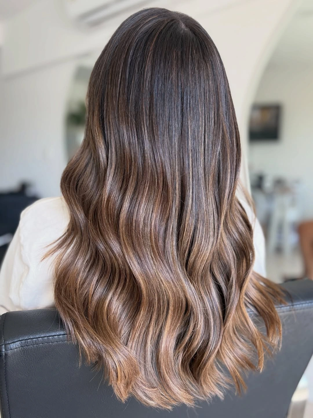 balayage on dark hair color Chocolate Brown Waves With Natural Dimension
