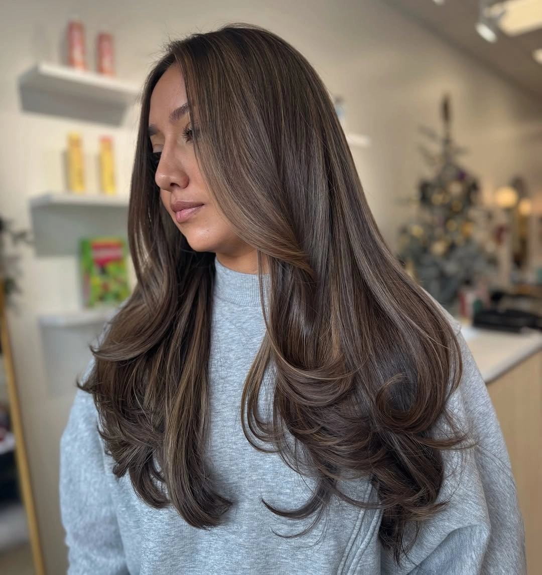 balayage on dark hair color Cool Brown Layers With a Glossy Finish