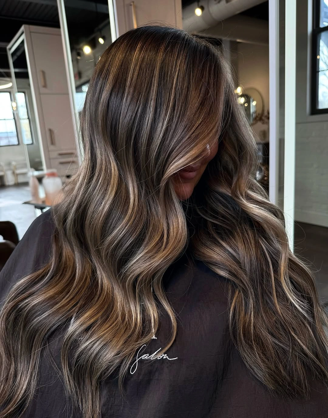 balayage on dark hair color Glossy Brown Waves With Natural Lightness