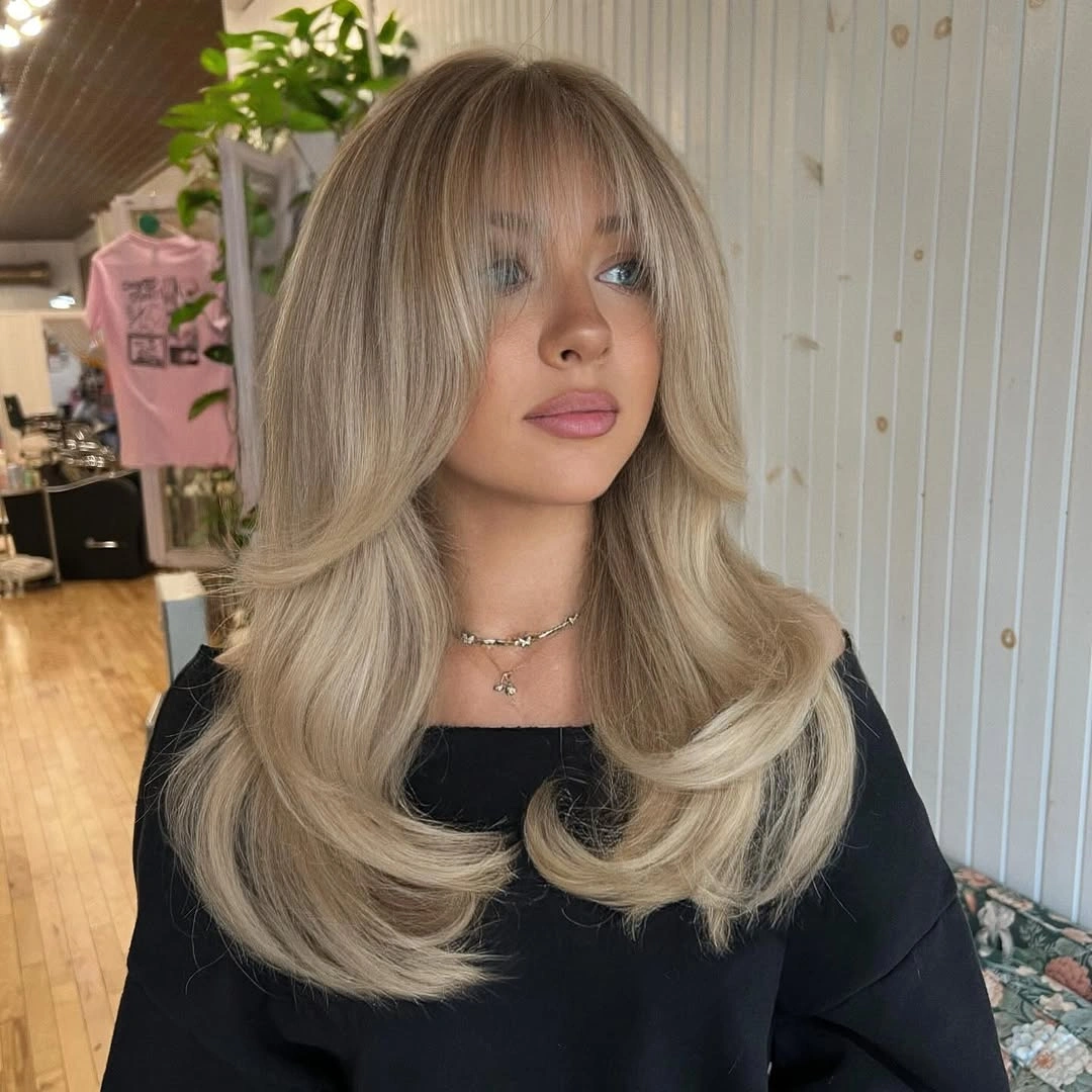 blonde winter hair color ideas - Cool Beige Blonde With Curtain Layers