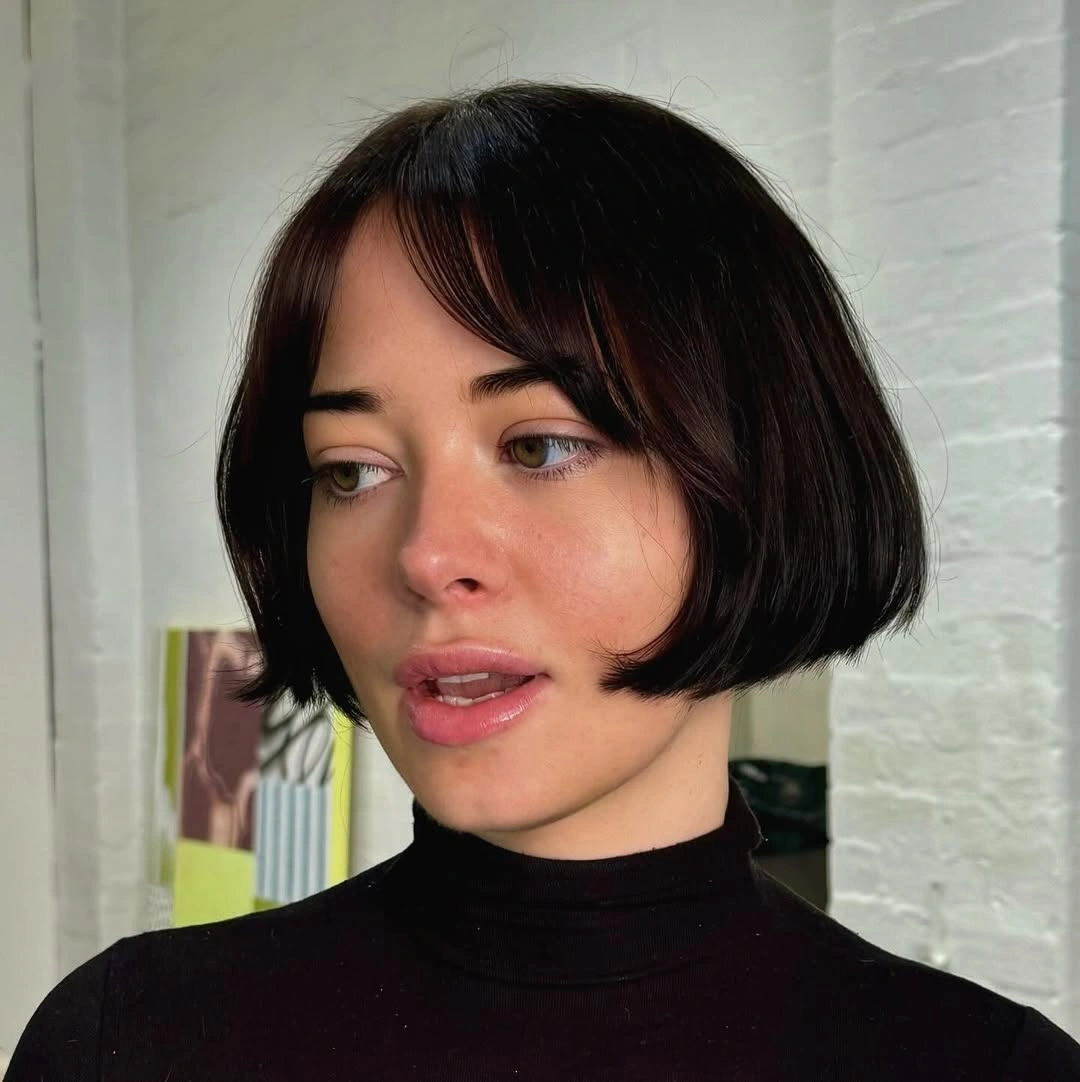 Bob with bangs haircut Glossy Black French Bob With Curtain Bangs