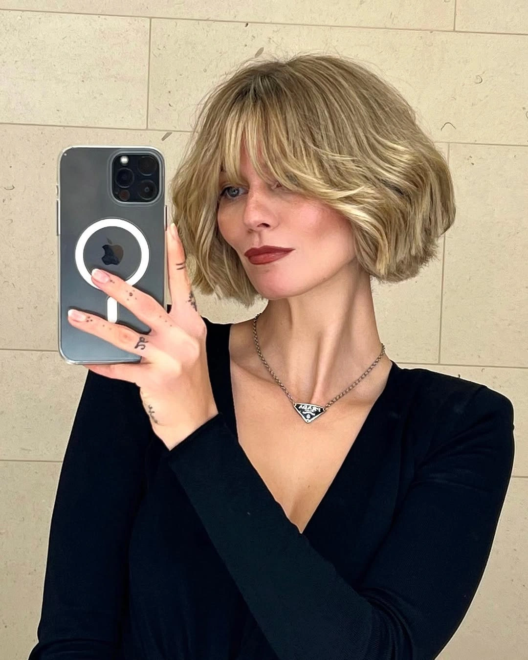 Bob with bangs haircut Blonde Rounded Bob With French Bangs