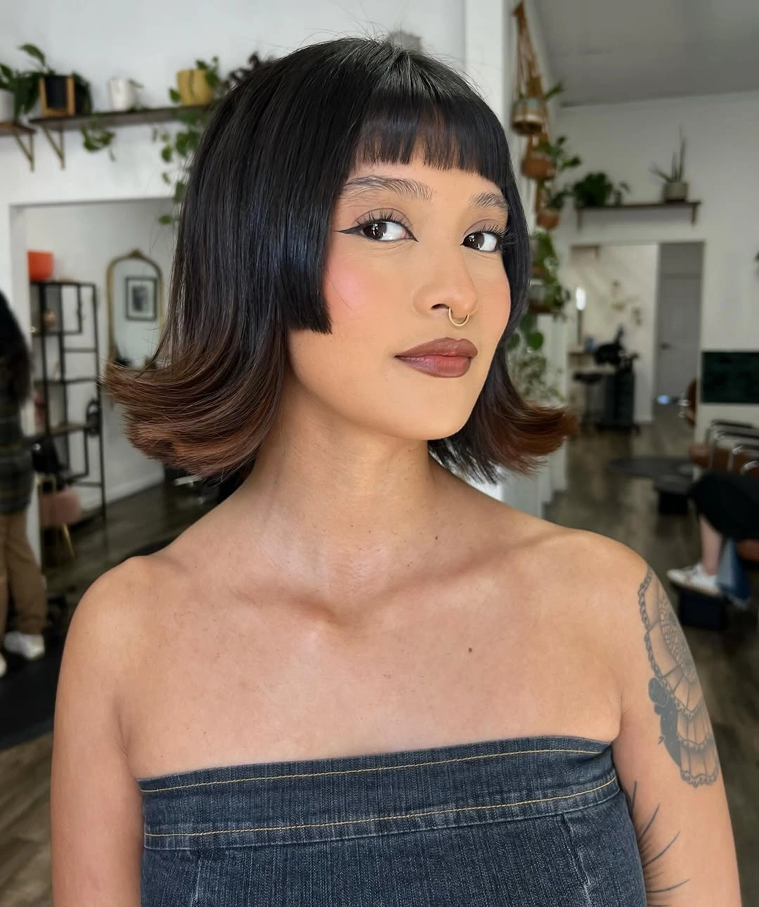 Bob with bangs haircut Dark Bob With Micro Bangs And Flipped Ends