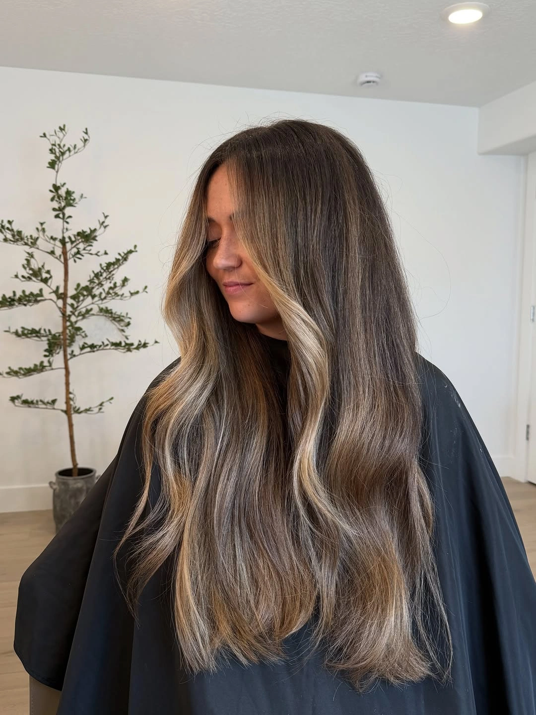 bronde balayage hair color Soft Beige Bronde With Sweeping Face Framing