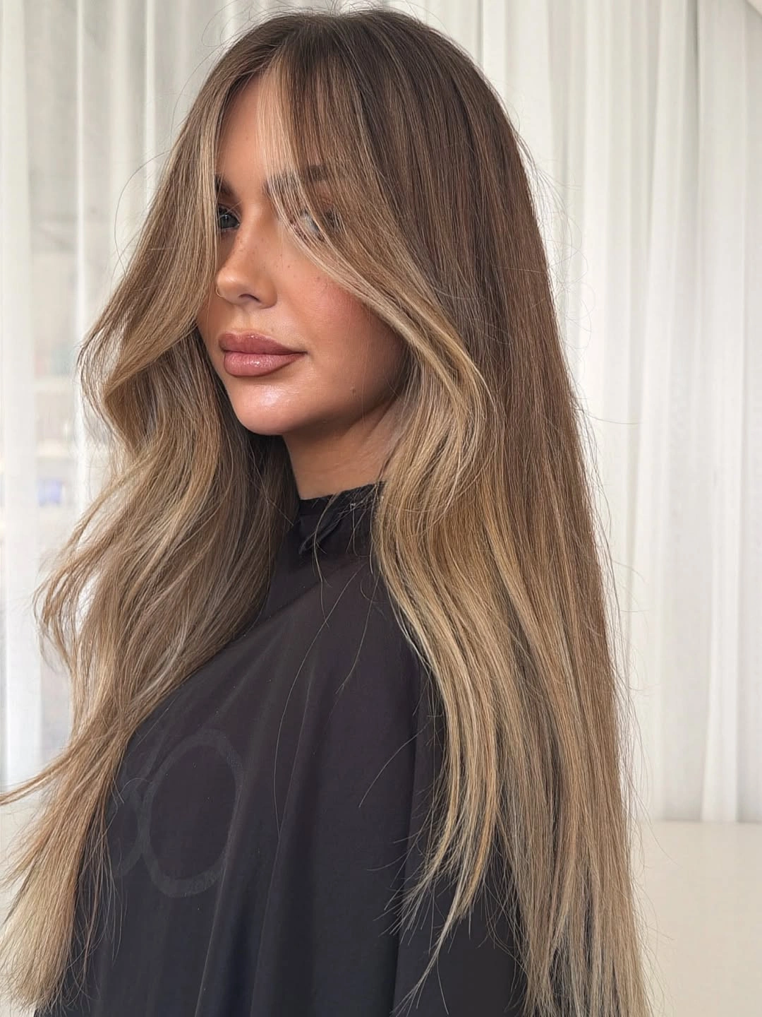 bronde balayage hair color Long Dimensional Bronde With Subtle Golden Ribbons