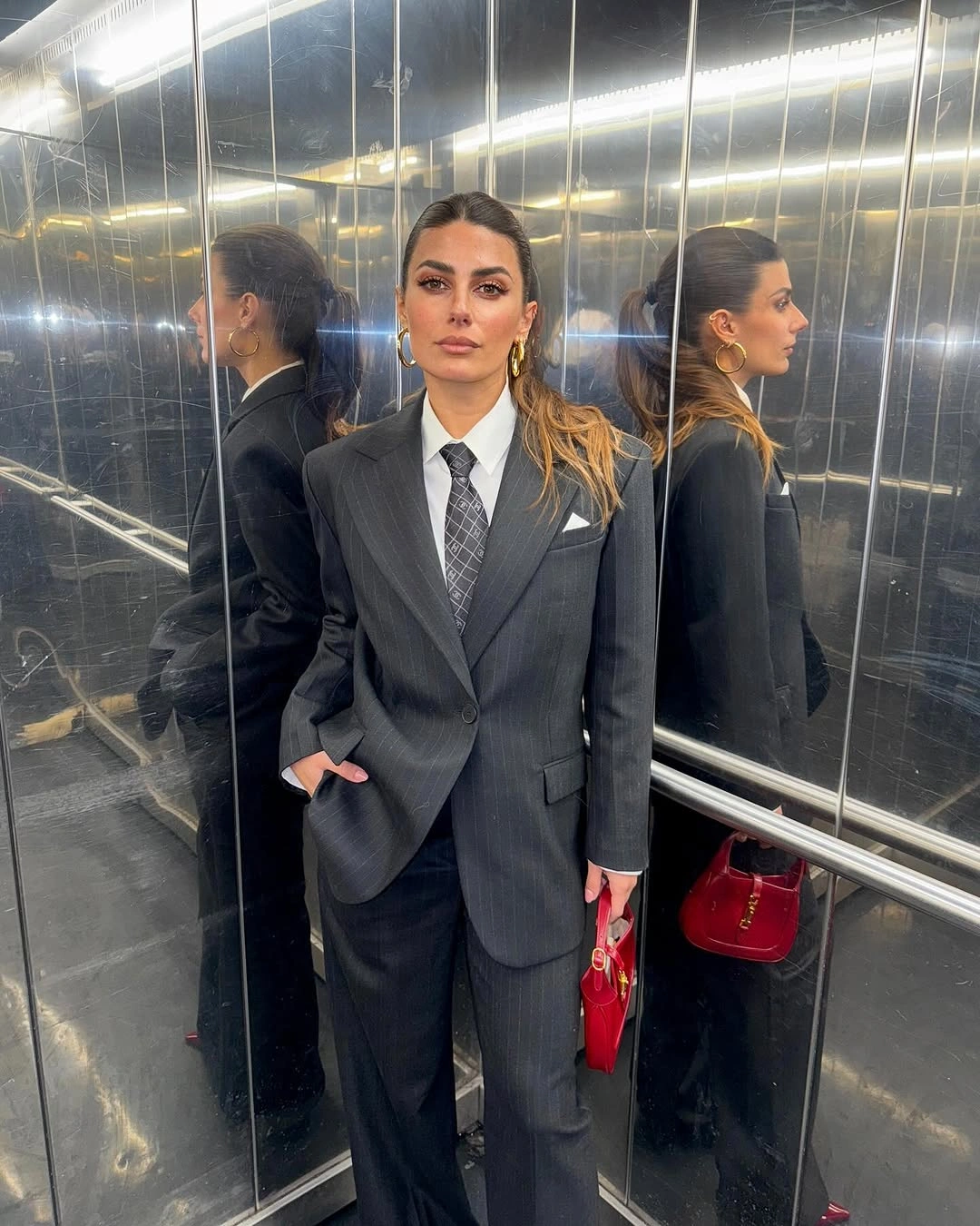 business casual dress code for women Pinstripe Suit With A Bold Red Accent