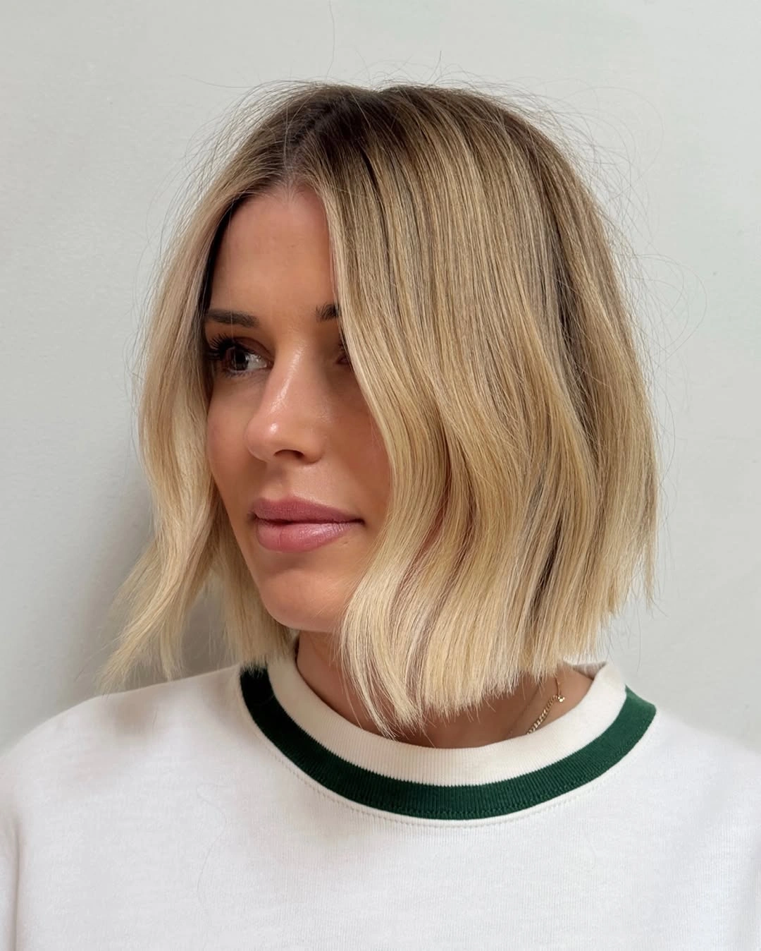 chic bobbed hair Soft Blonde Bob With A Modern Curve