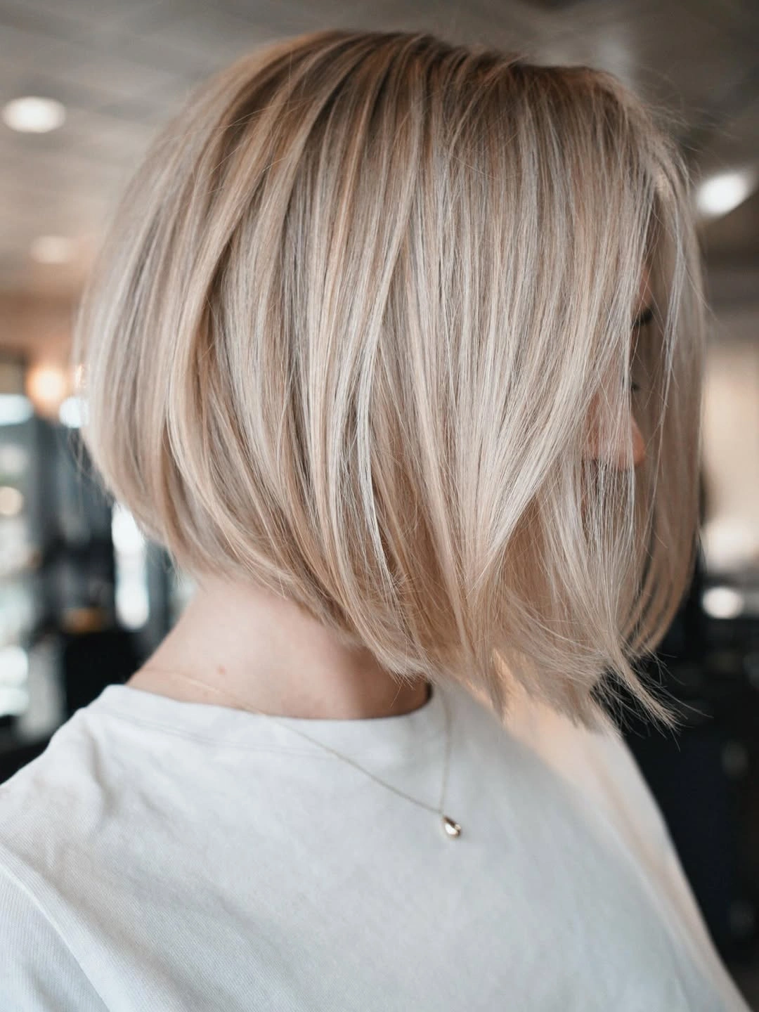chic bobbed hair Dimensional Blonde Bob With Feathered Layers