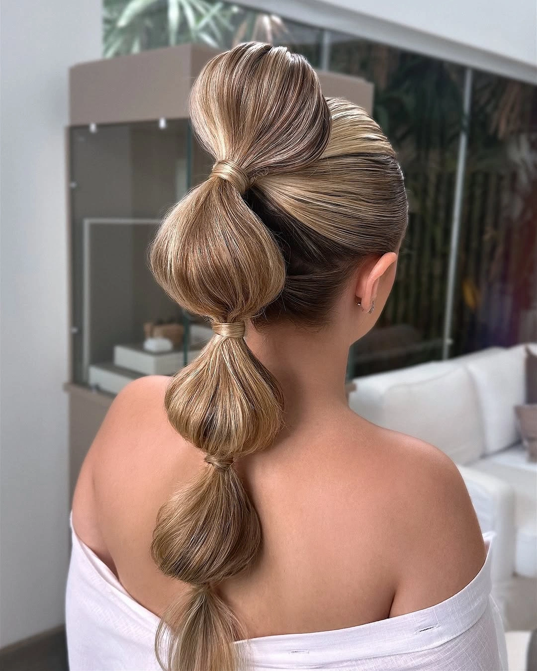 chic bubble braid hairstyle Sculpted Blonde Bubble Ponytail