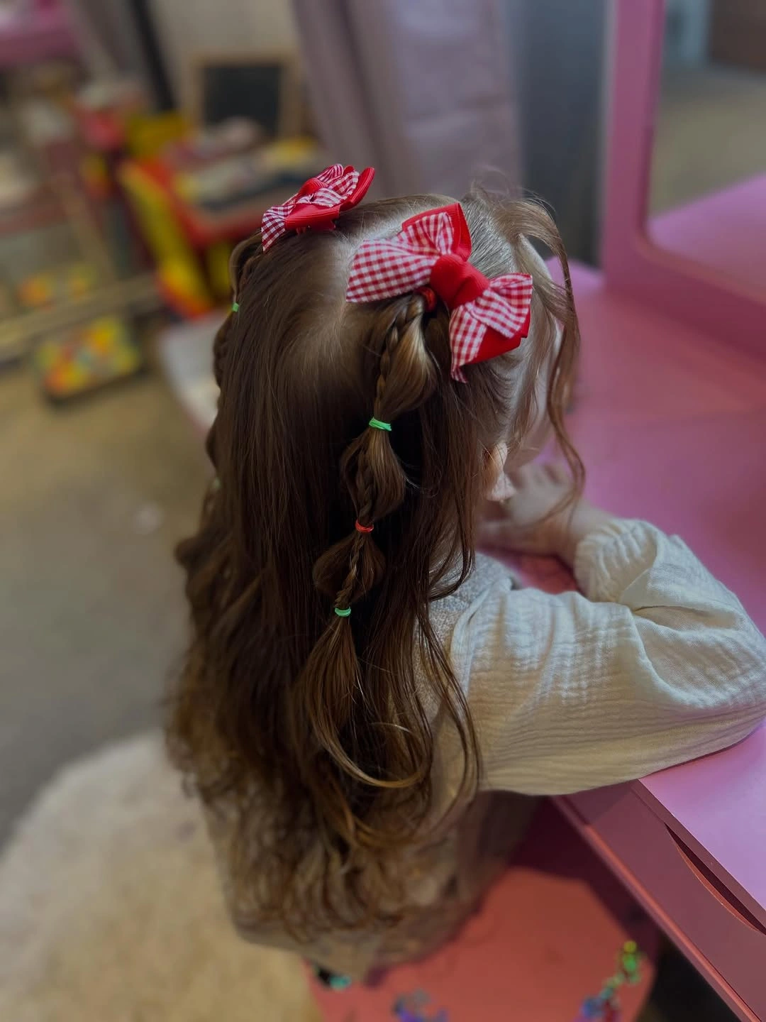 christmas hairstyles 2026 Gingham Bows And A Playful Braid