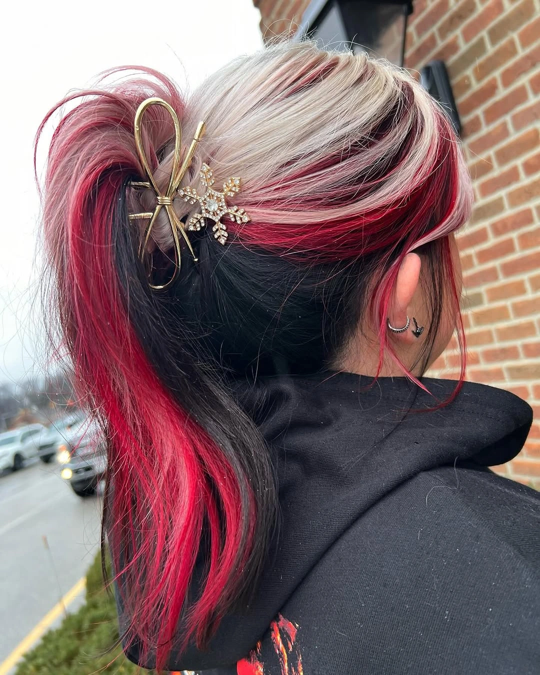 christmas hairstyles 2026 Red And Black Holiday Half Up Style