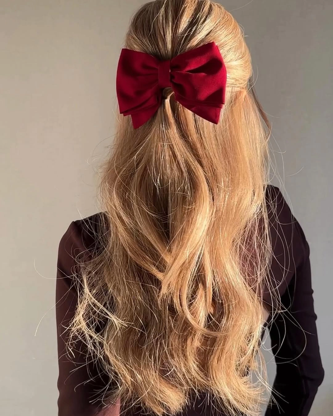 christmas hairstyles 2026 Velvet Bow Half Up Hairstyle