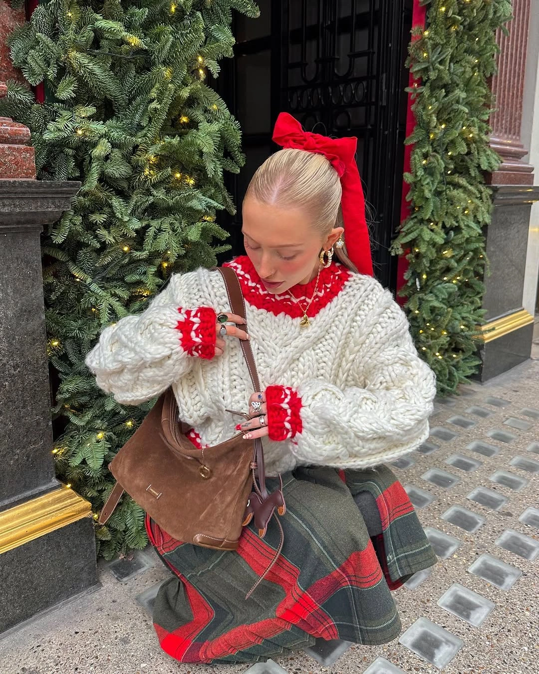 christmas outfits 2026 Festive Knitwear With A Tartan Skirt