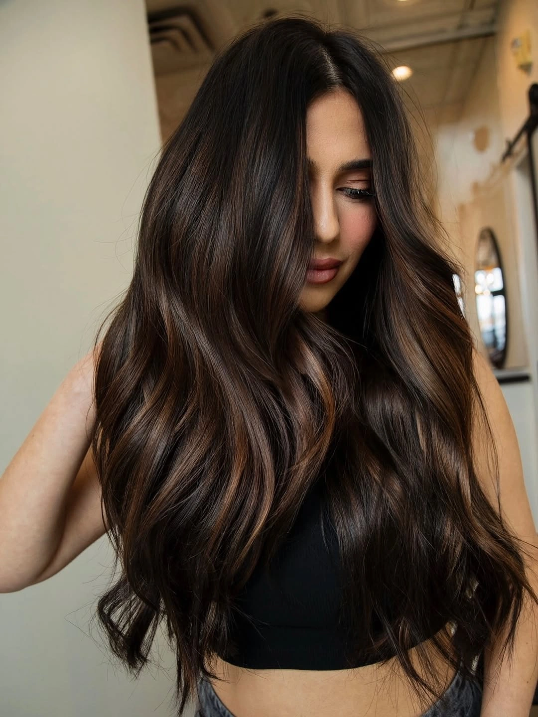 cozy winter hair color ideas for brunettes Dark Espresso Waves With Warm Brown Dimension