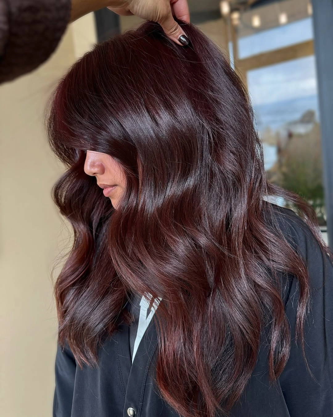 cozy winter hair color ideas for brunettes Deep Burgundy Brown With Glossy Waves