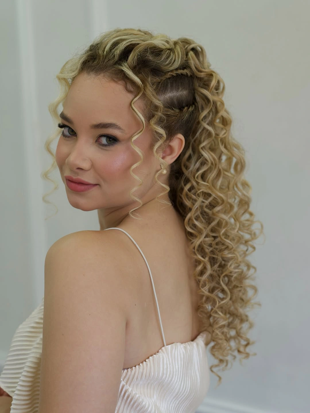 cute braid hairstyle for women Soft Curly Half-Up Braid With Romantic Detail