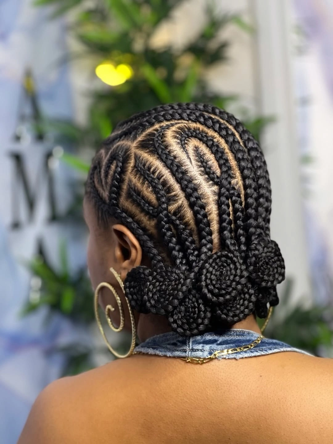 cute braid hairstyle for women Curved Cornrows With A Low Braided Bun