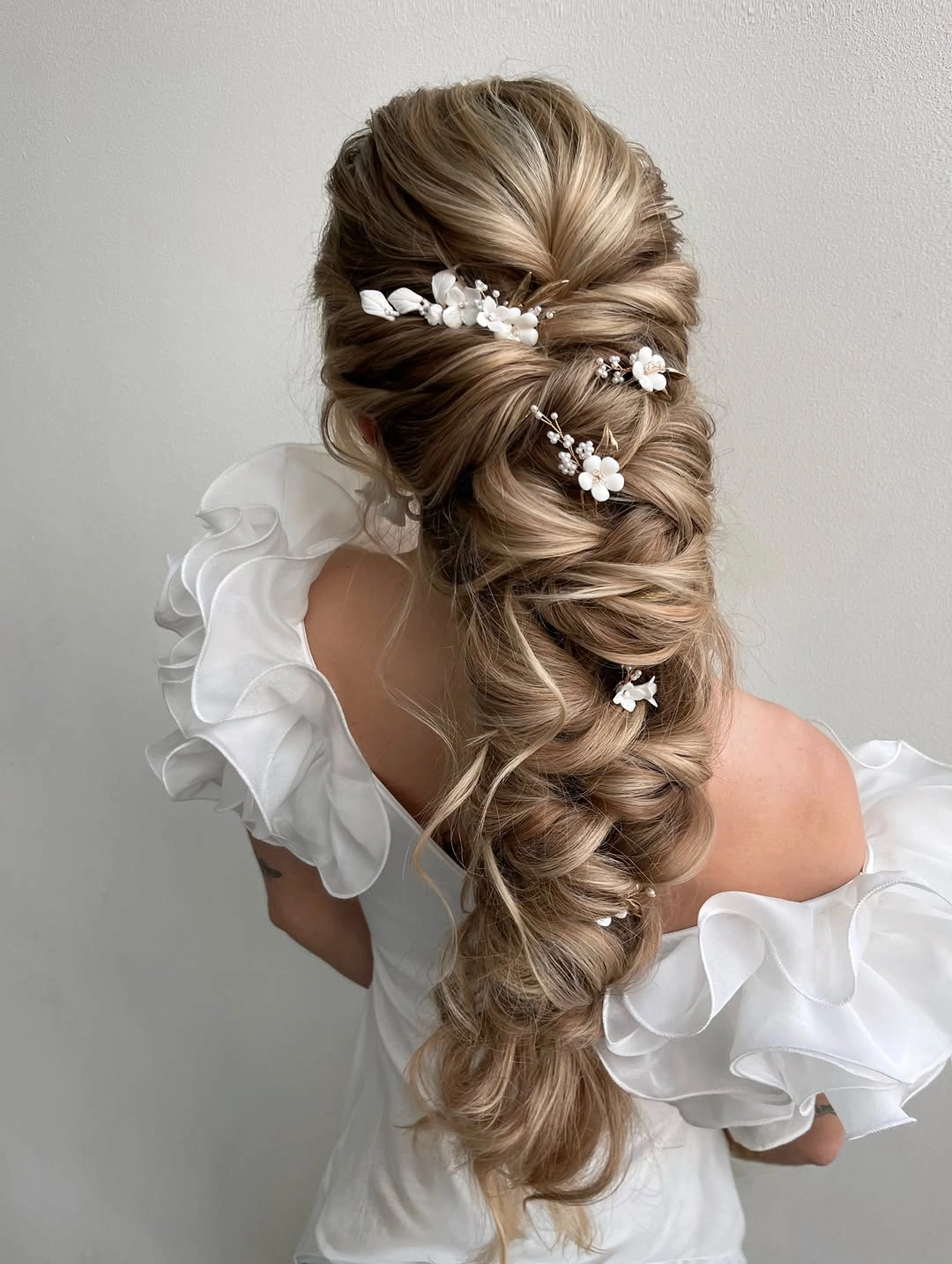 cute braid hairstyle for women Romantic Blonde Braid With Floral Details