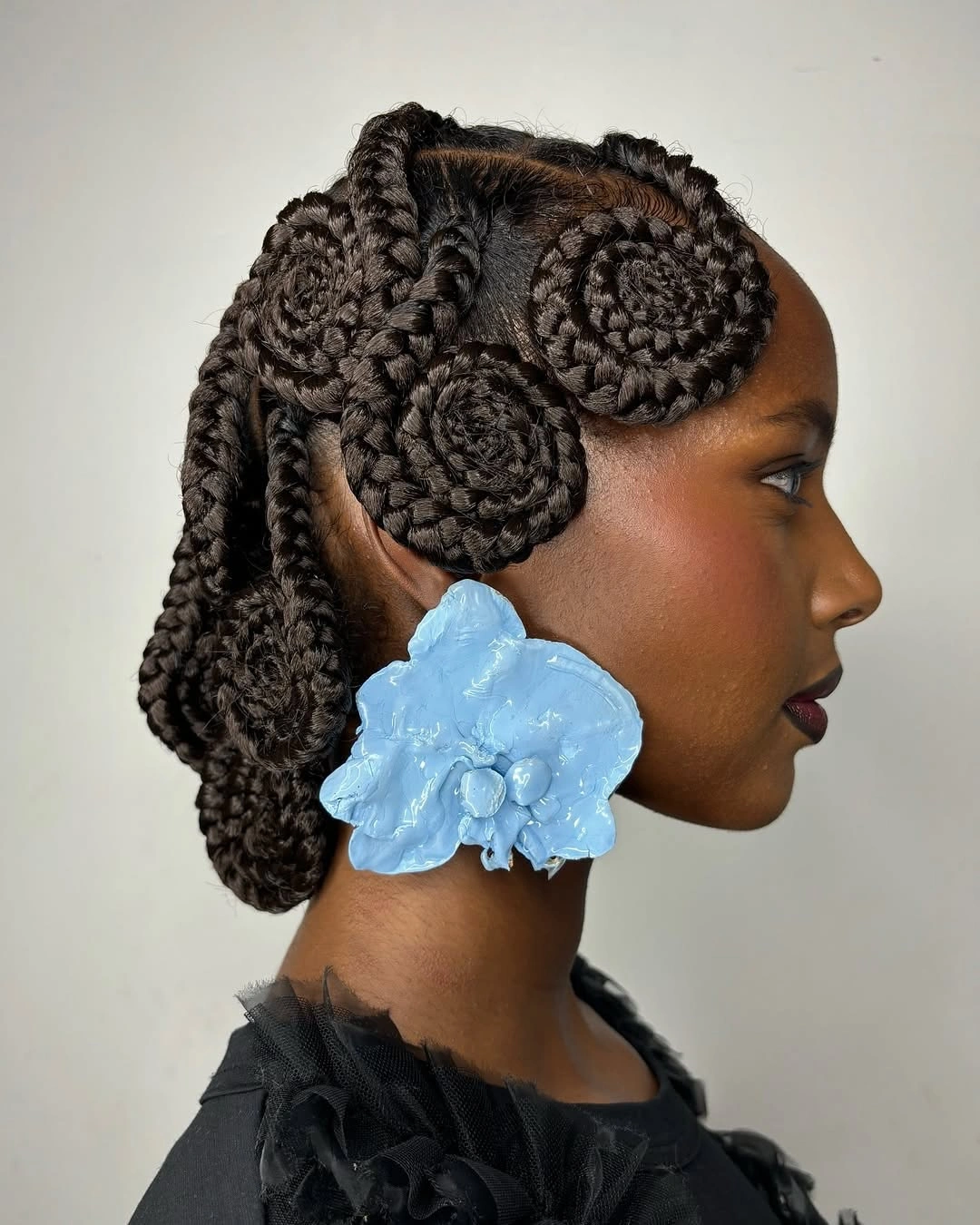 cute braid hairstyle for women Sculptural Braided Flowers For A Statement Look