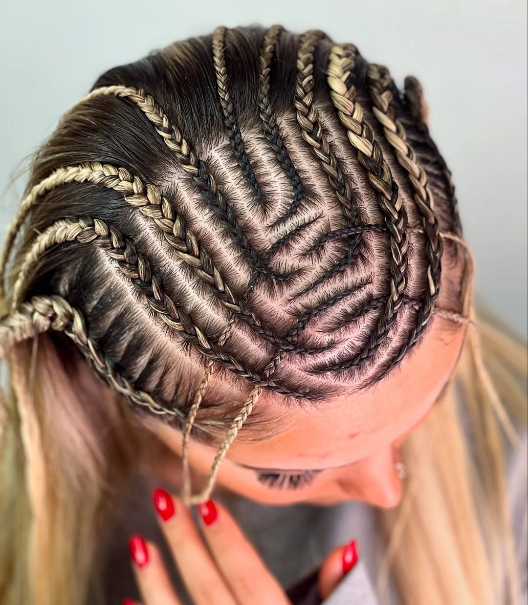 cute braid hairstyle for women Graphic Cornrows With Golden Braided Accents