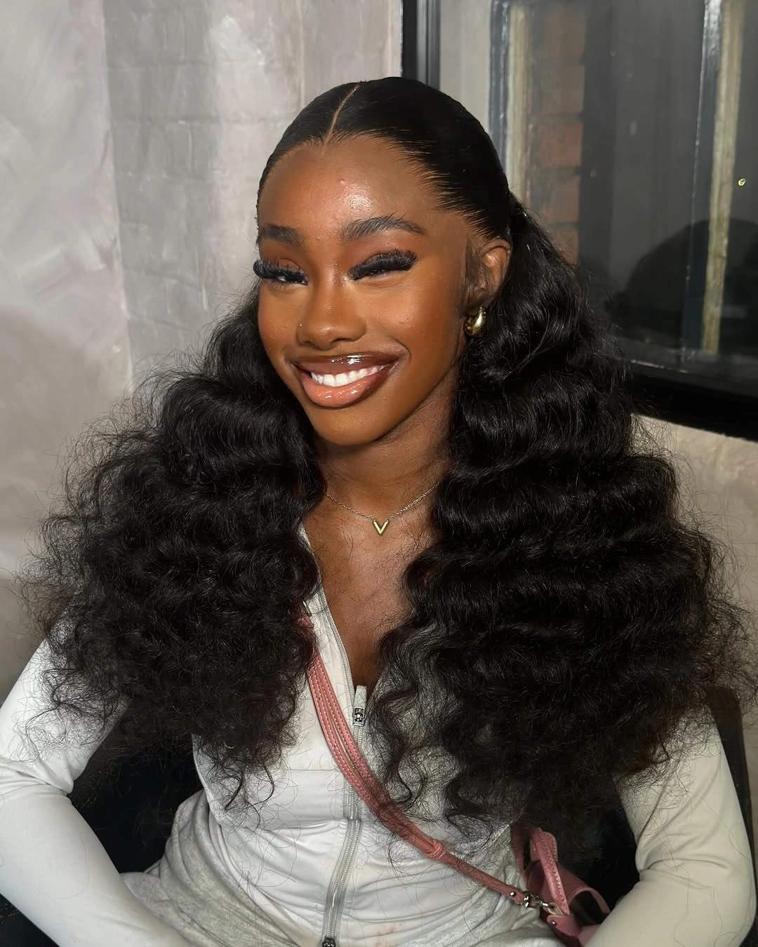 deep waves hairstyle - Textured Black Half Up Waves