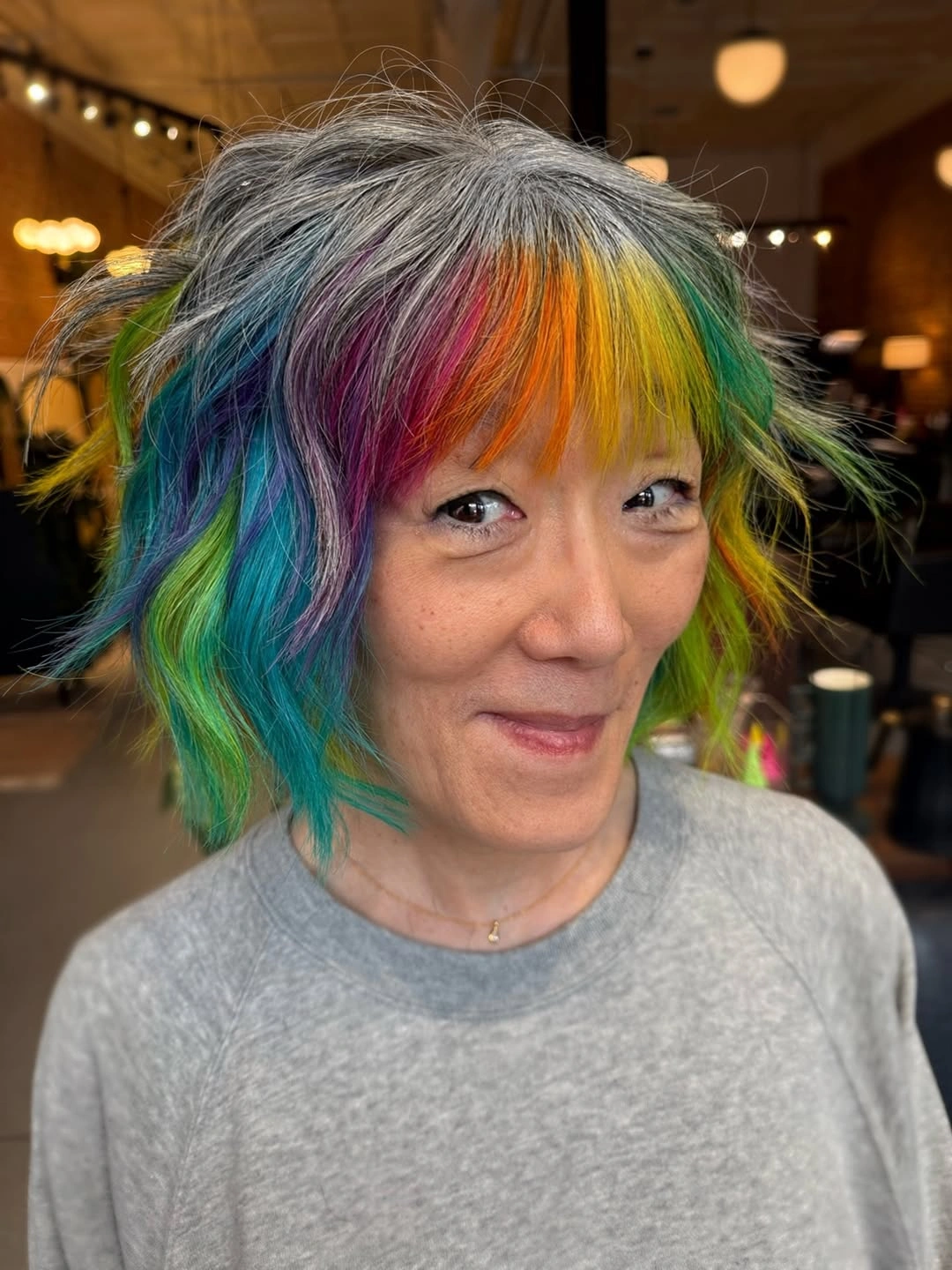 dyed hair for women Rainbow Layers With A Silver Base