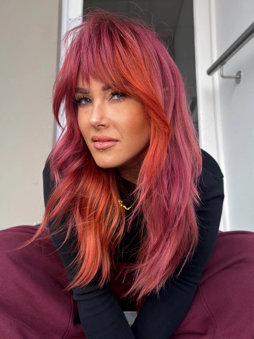 dyed hair for women Berry Pink Hair With Vibrant Copper Layers