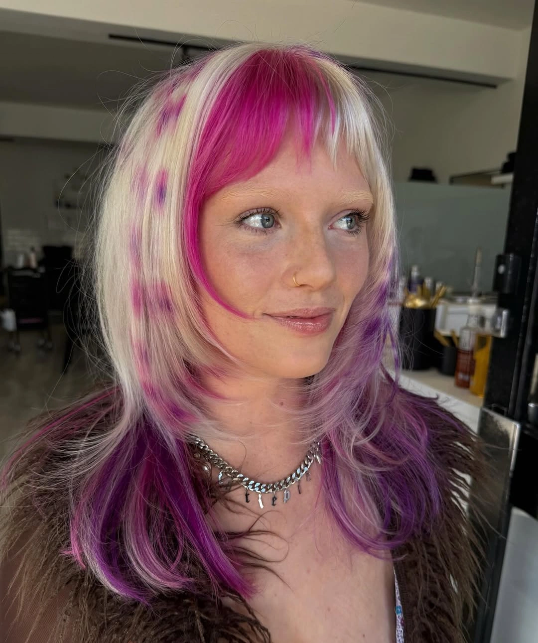 dyed hair for women Short Blonde Layers With Pink And Purple Accents