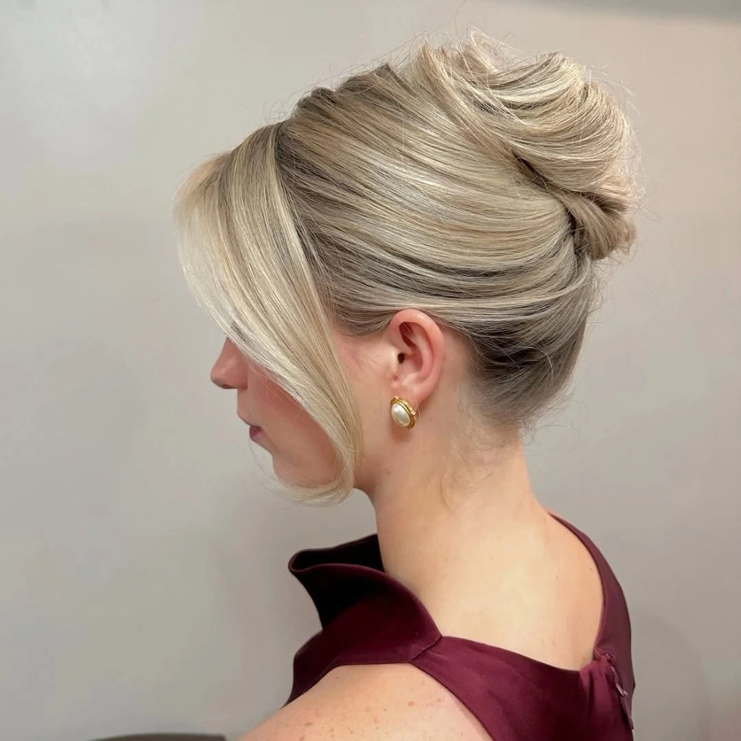 funeral hairstyles for women Soft Gray French Twist With A Gentle Face-Framing Strand