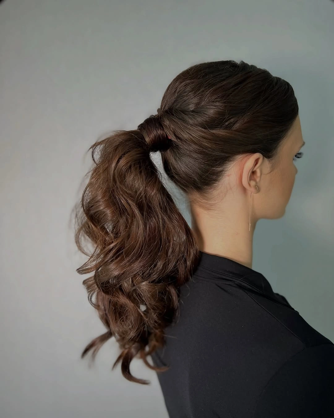 funeral hairstyles for women Soft Curled Ponytail With A Polished Crown