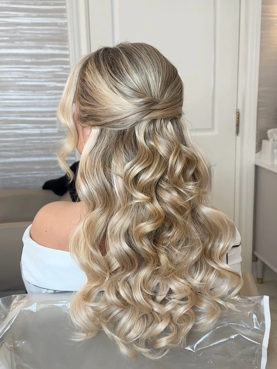 funeral hairstyles for women - Classic Blonde Half Up Style With Defined Curls