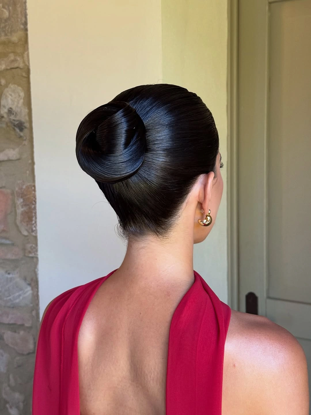 funeral hairstyles for women Polished Black Knot With A Minimalist Finish