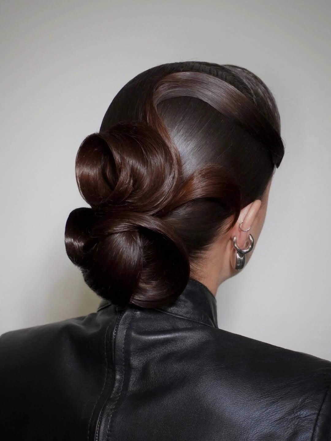 funeral hairstyles for women Polished Brunette Double Bun
