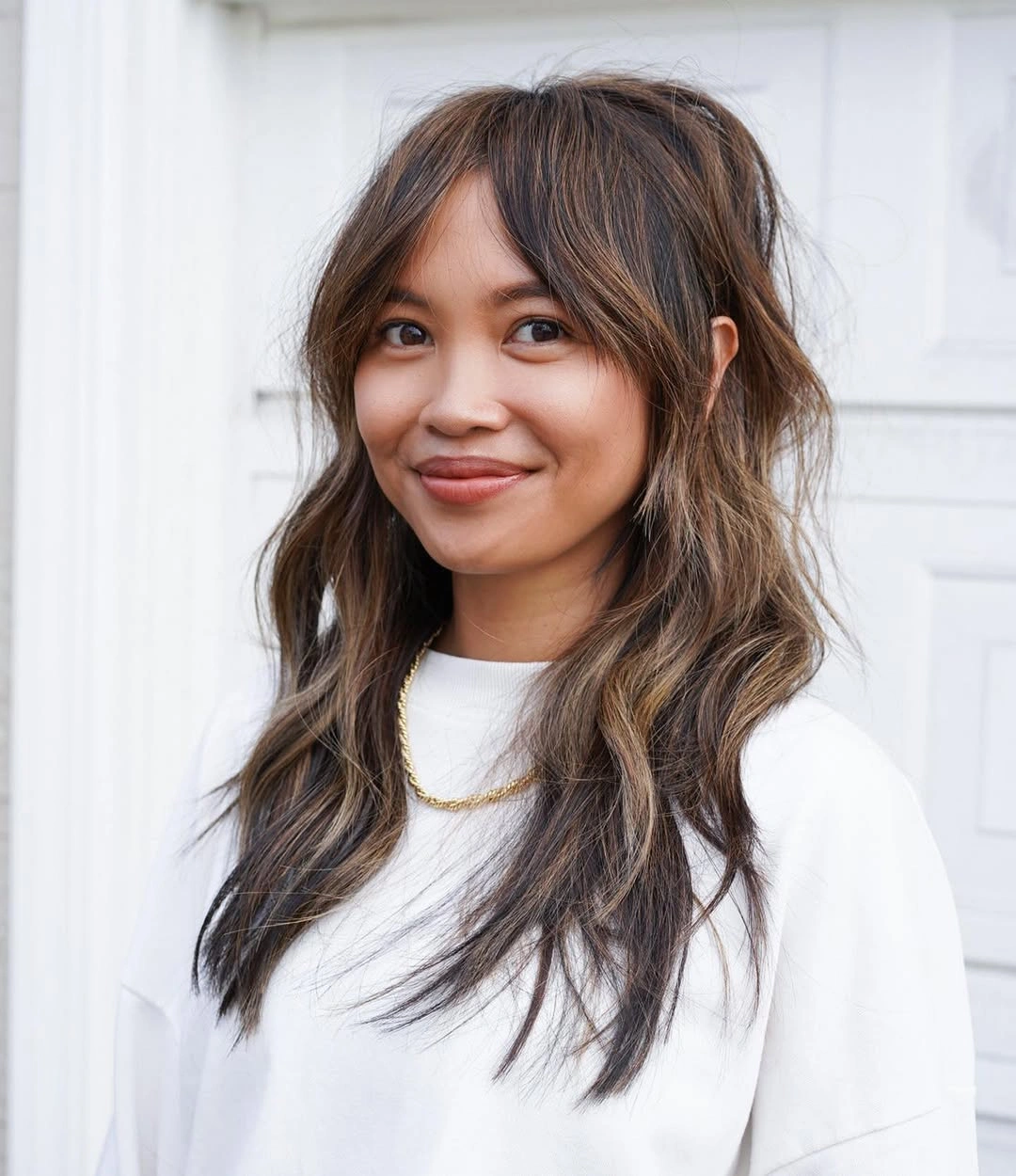 haircuts for plus size women 2027 Long Layered Waves With Face Framing Bangs