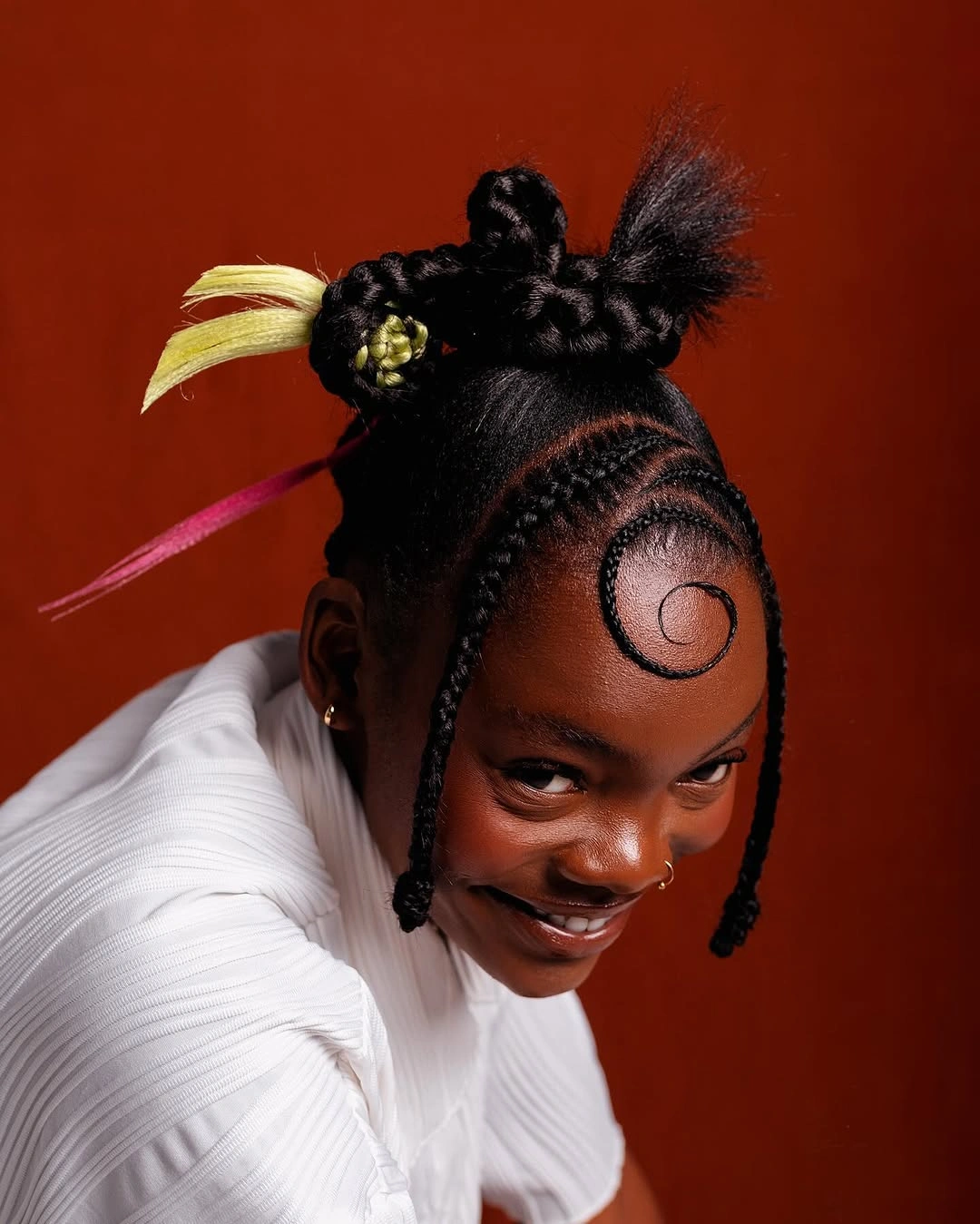 hairstyle ideas for black women 2027 Sculptural Braided Buns With Artistic Details