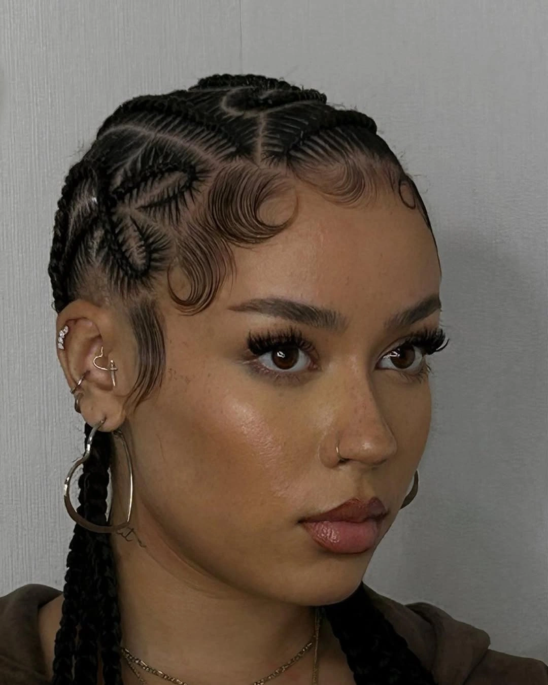 hairstyle ideas for black women 2027 Sleek Cornrows With Sculpted Baby Hairs