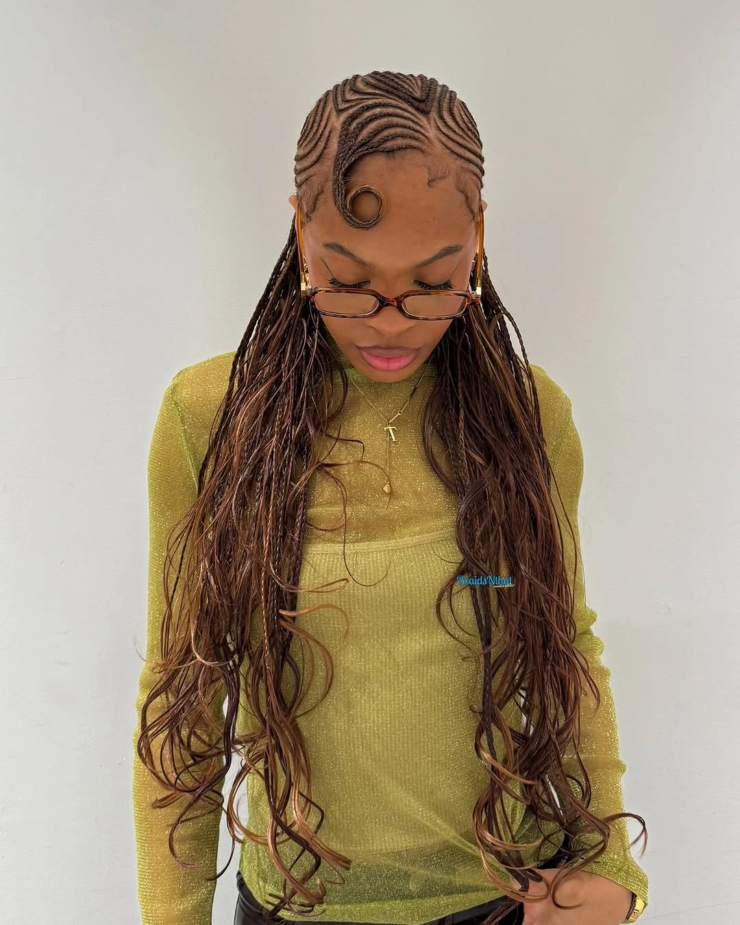 hairstyle ideas for black women 2027 Long Wet Look Braids With Curved Parting