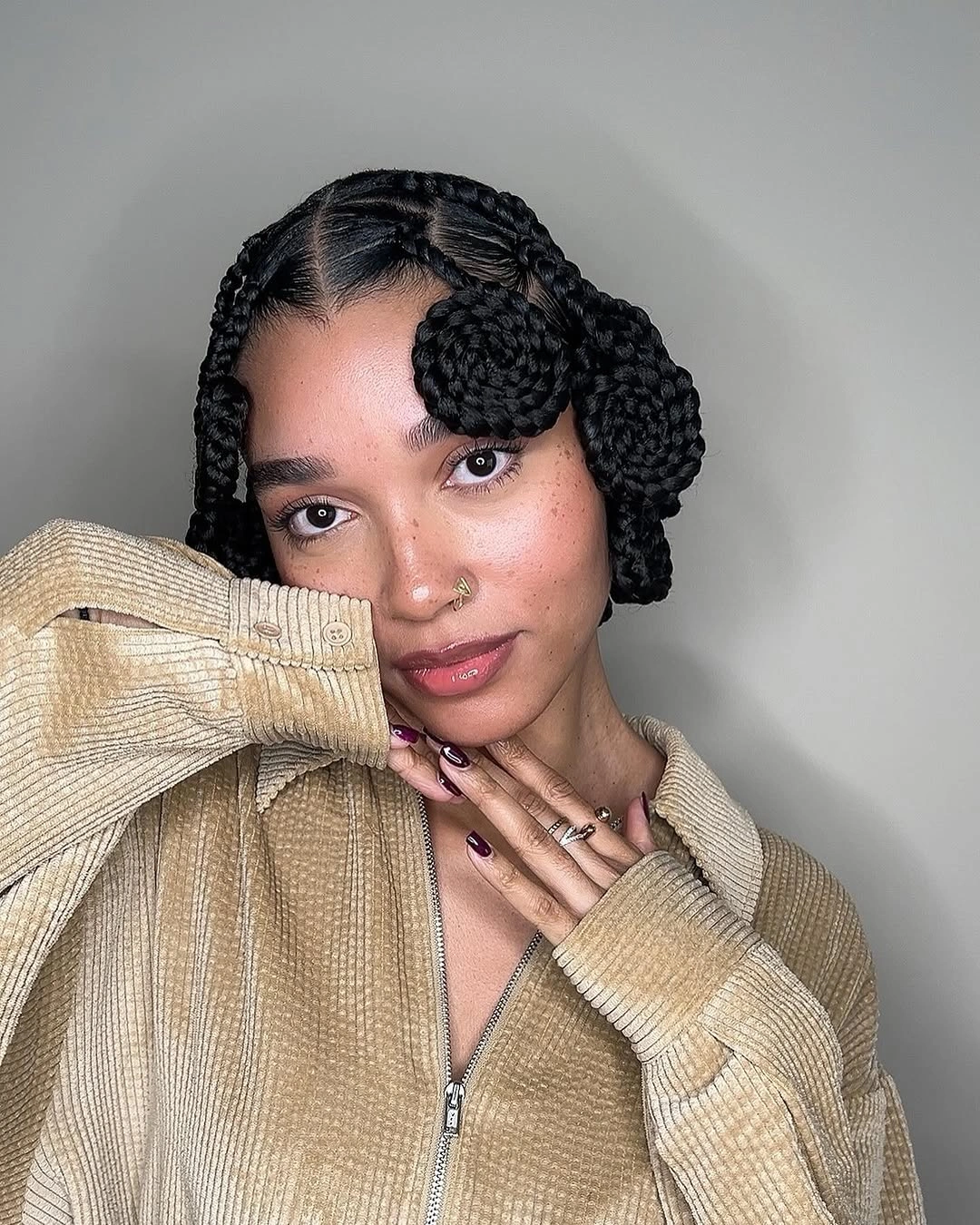 hairstyle ideas for black women 2027 Braided Side Buns With Soft Face Framing